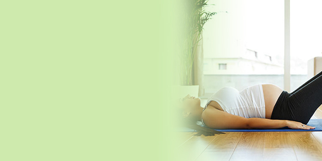 Woman doing pelvic floor exercises on a yoga ball